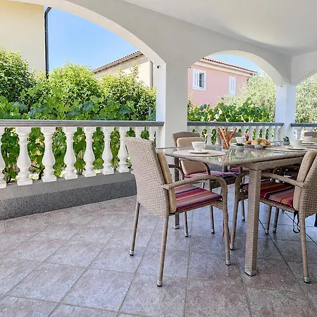 Four-bedroom In Casa vacanze